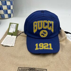Women’s Gucci, GG  blue/yellow baseball hat, size small adjustable made in Italy